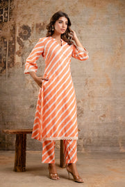 Bright orange kurta pant set by Aaronee