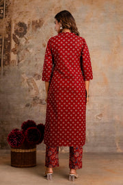Front view of red kurti set with traditional print