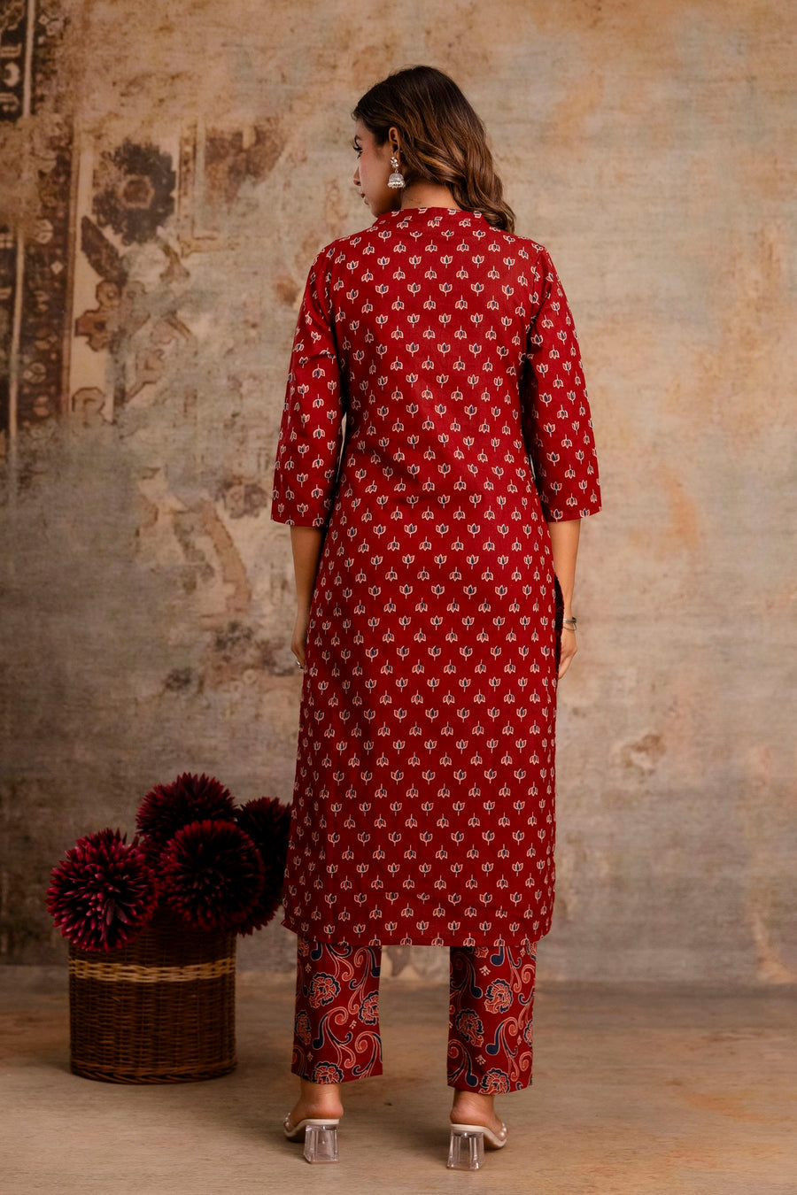 Front view of red kurti set with traditional print