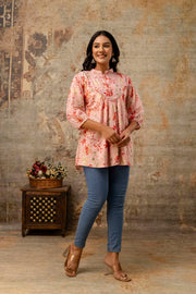 Front view of short floral kurta top