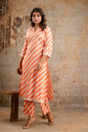 Bright orange kurta pant set by Aaronee