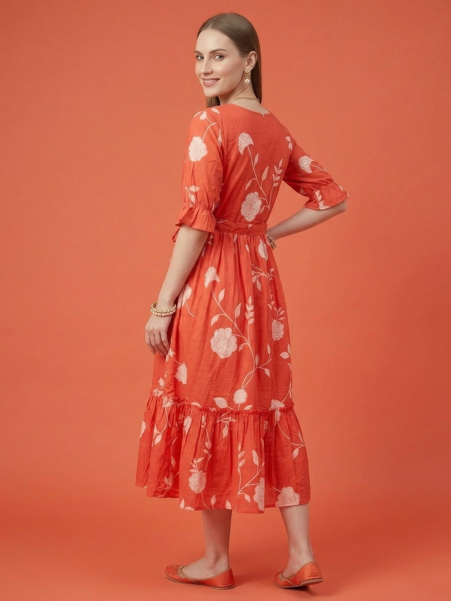 Women's orange premium cotton dress with floral vine print