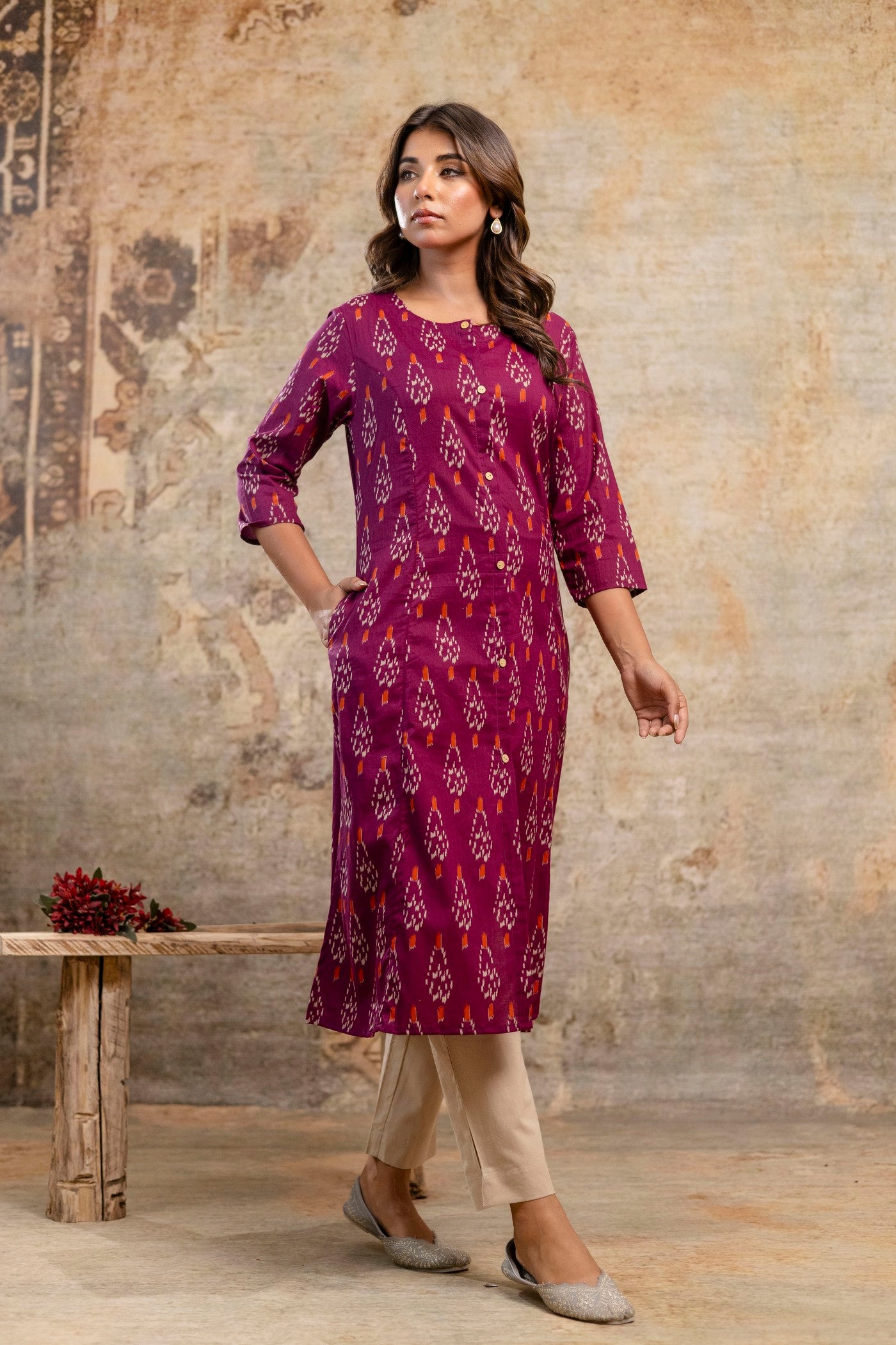 Woman in maroon Ikat cotton kurta