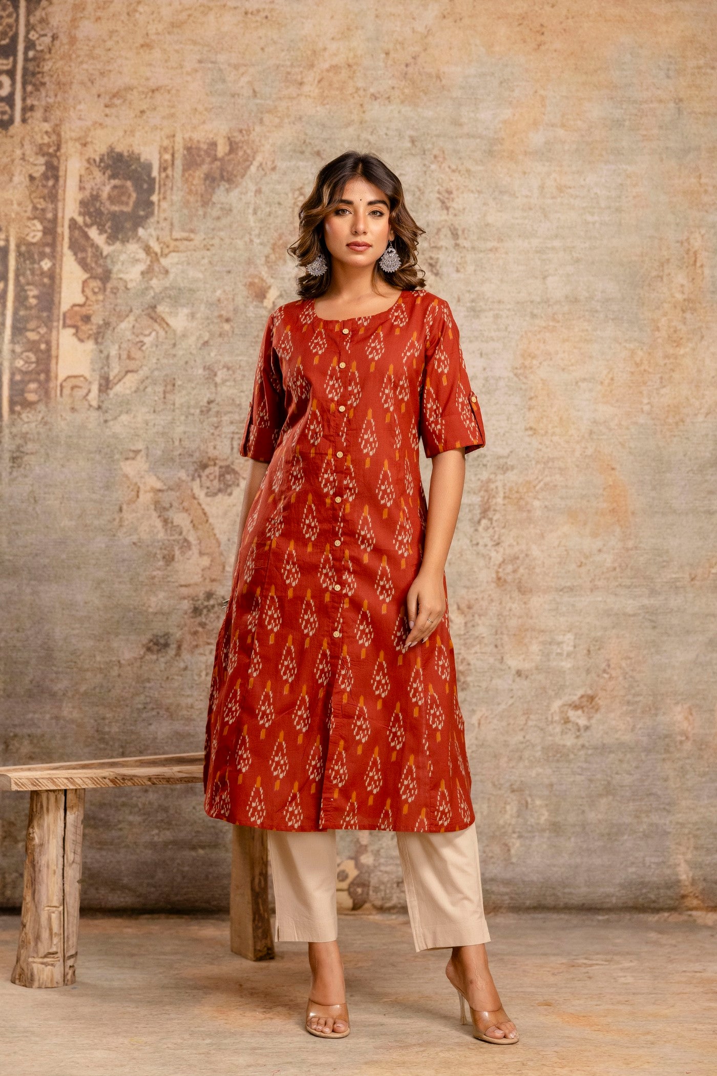 Woman wearing rust Ikat cotton kurta