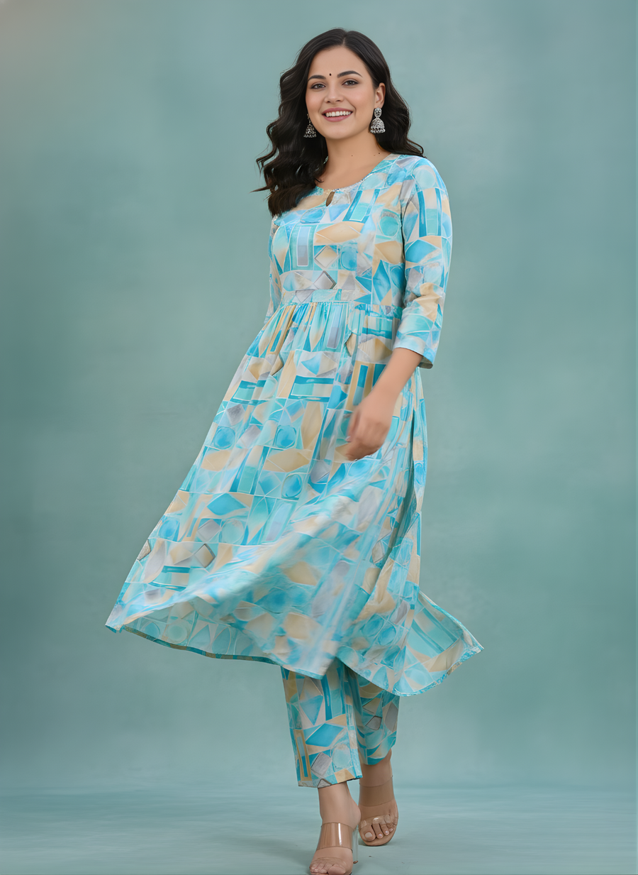 Woman wearing a blue patterned outfit on a gray background