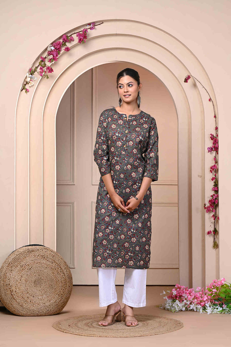 Discover elegance with our Brown Straight Printed Cotton Kurti