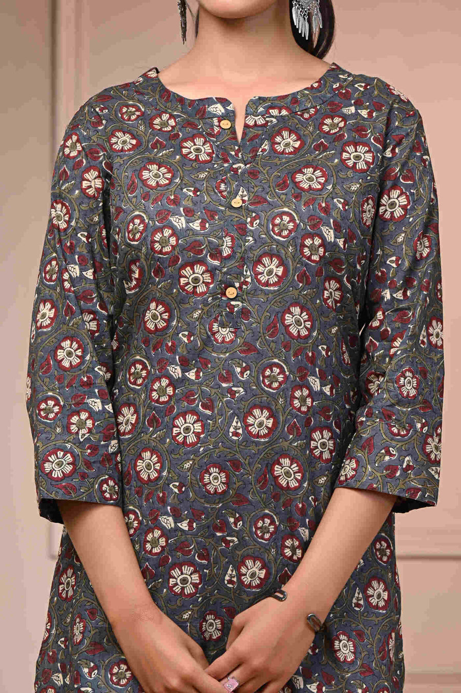 Discover elegance with our Brown Straight Printed Cotton Kurti