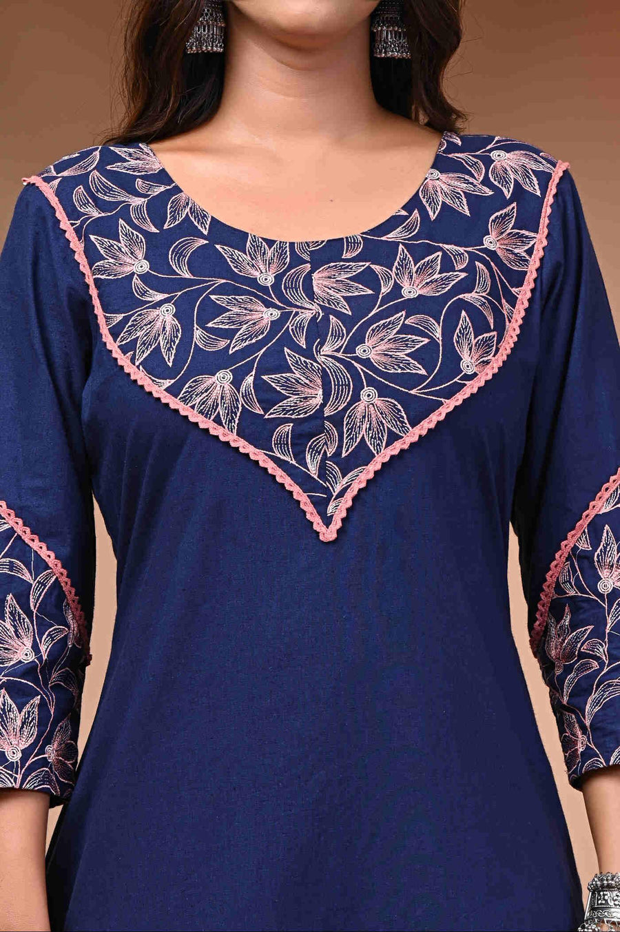 Step into Style with Our Navy Blue Embroidered Kurti