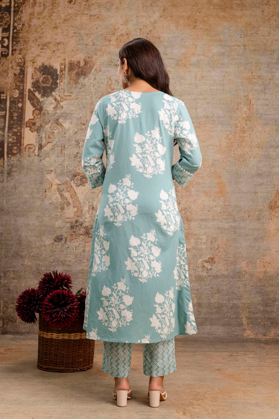 Sea green floral cotton kurta pant set by Aaronee