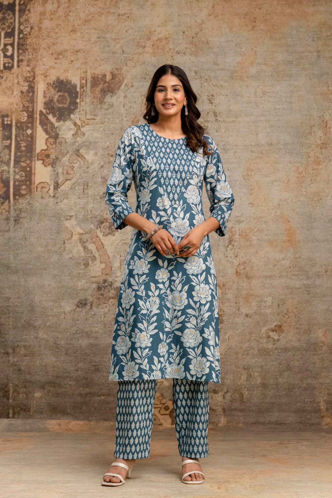 Woman in blue floral cotton kurta set