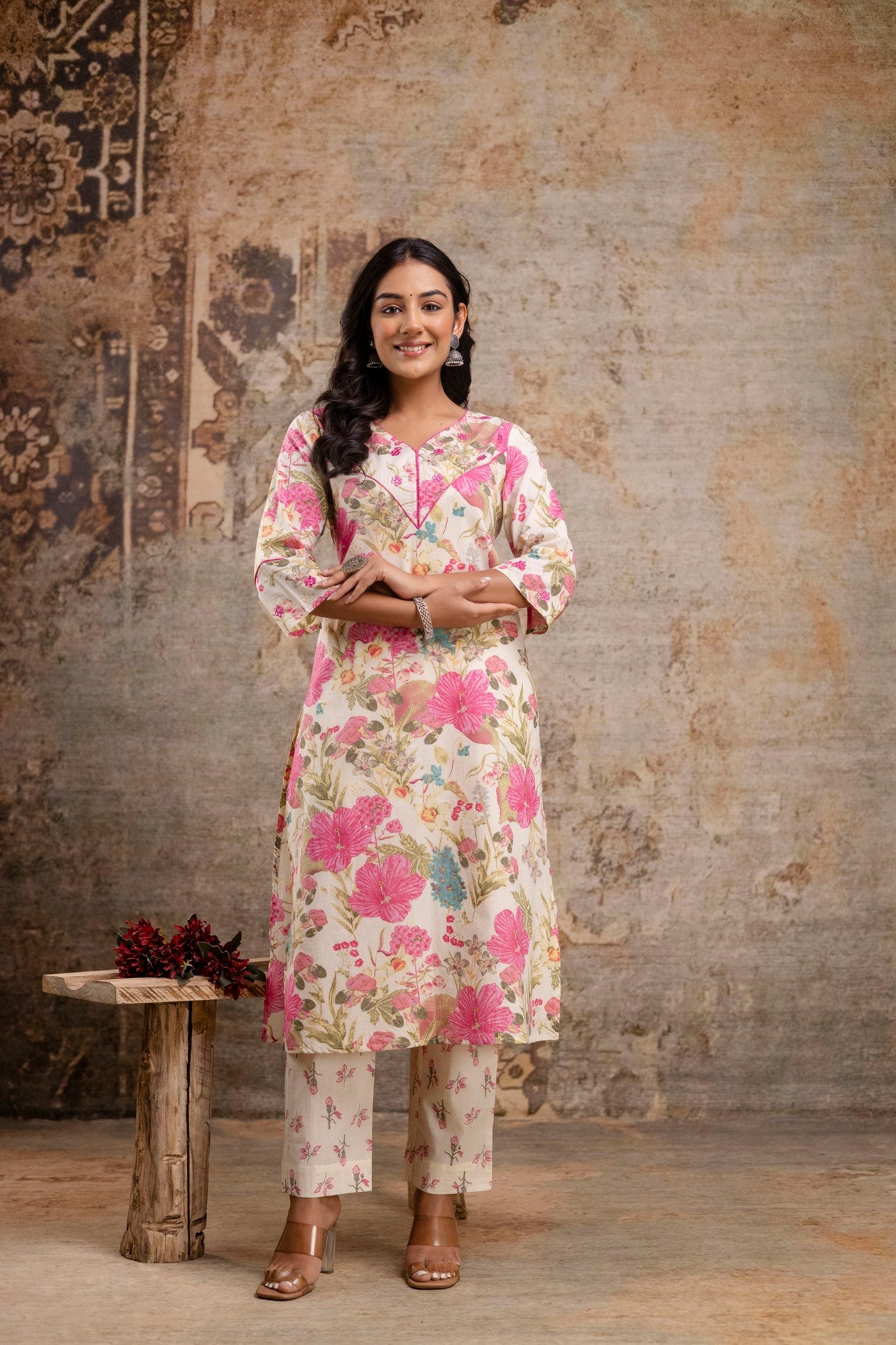 Woman in cream floral cotton kurta set