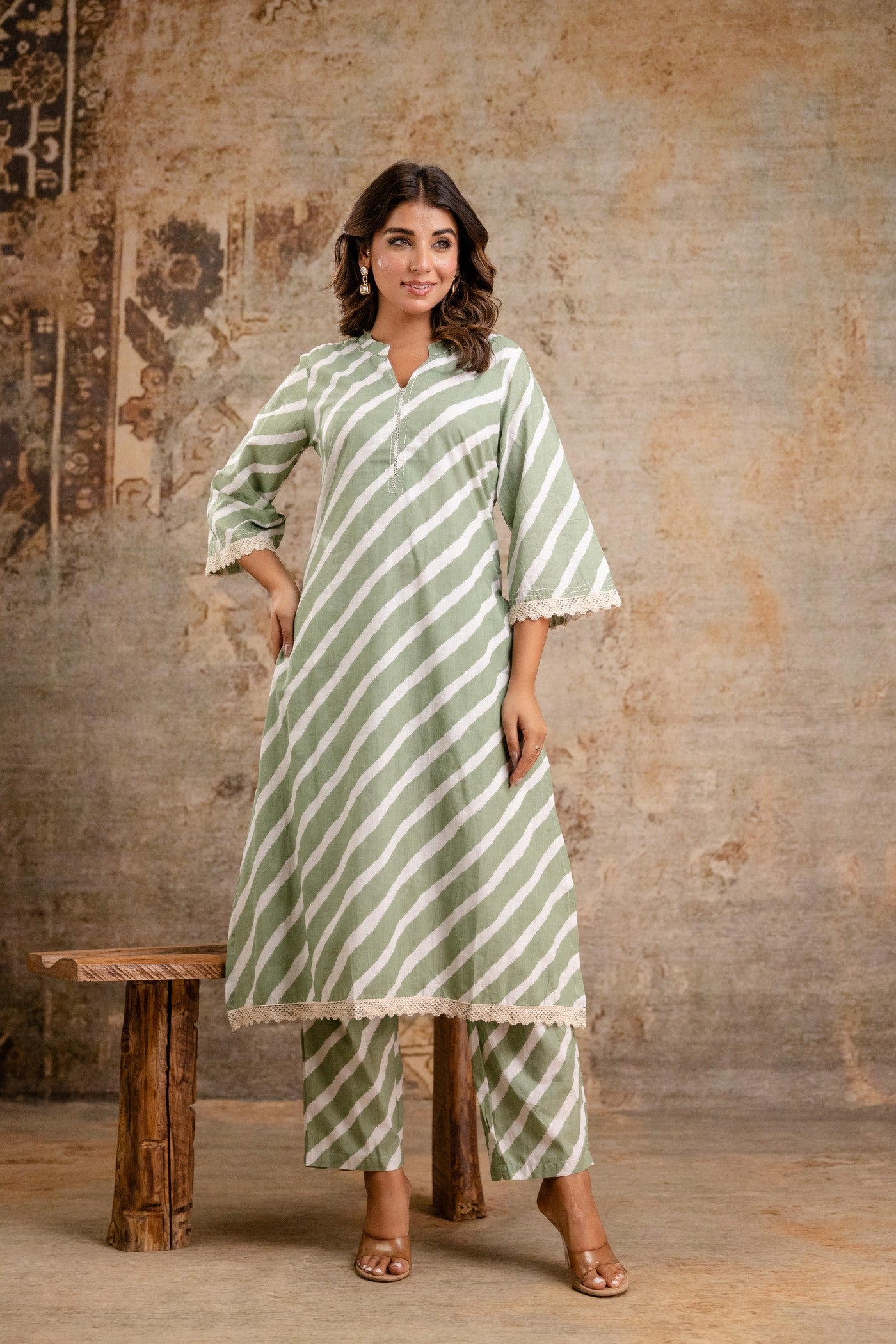 Woman in green striped pure cotton kurta set