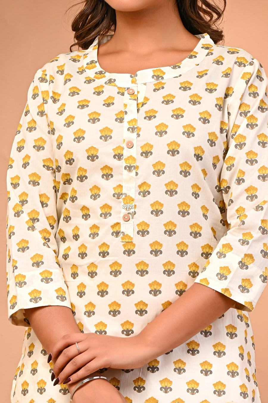 BuckUp Your Wardrobe with Aaronee Yellow Butta Print Kurti